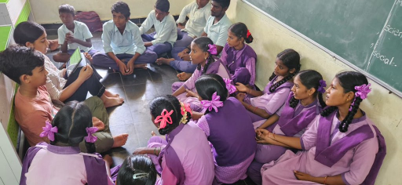 Students exploring the classroom library