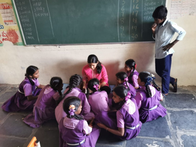Child smiling after receiving a book