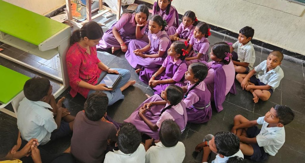 Teacher guiding students